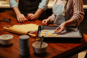 Fototapeta premium Baking homemade cookies in a cozy kitchen