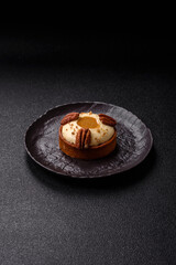 Sweet round tart with white citrus cream and pecans