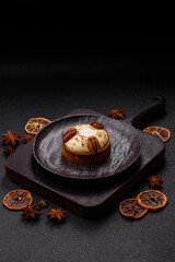 Sweet round tart with white citrus cream and pecans