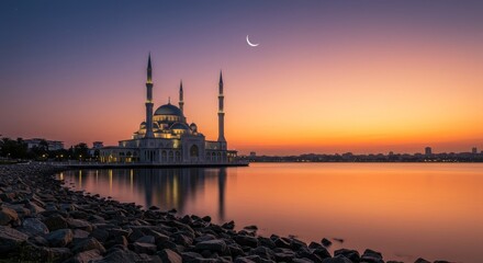Fototapeta premium Ramadan Sunset Mosque by the Water - Tranquil Ramadan scene. Mosque by water, crescent moon, sunset. Peace, spirituality, faith, celebration, hope