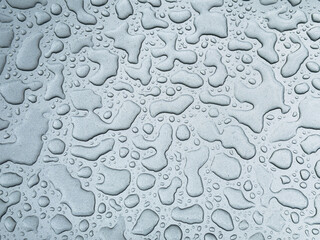 Water drops on grey background