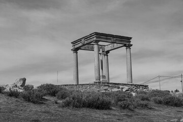 The Mirador Los Cuatro Postes or the Four Posts, an ancient monument viewpoint over the Spanish fortified walled city of &Aacute;vila marks the city limits