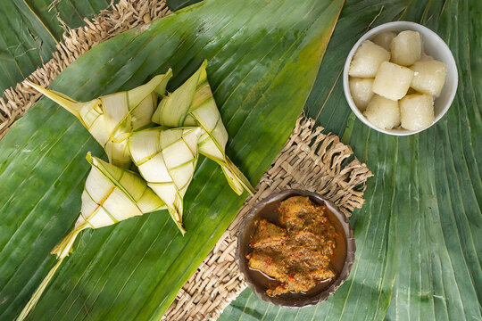 Eid Celebration Concept - ketupat and rendang with copy space background.