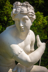 Sculpture "Bathing Venus" at the Gardens of Woerlitzer Park on a sunny Summer Day; Close-up