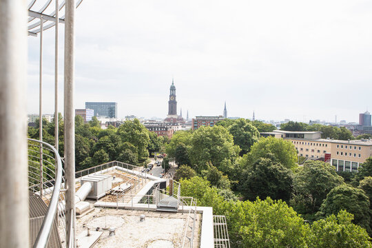 Cityscape of buildings, trees and harbor. Hamburg, Germany