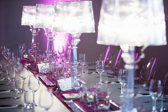 Set table for an extravagant dinner party. 