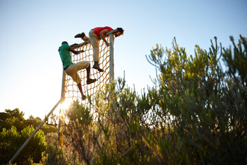 Barrier obstacles, rope or people climbing for strength, endurance exercise or bootcamp challenge. Military survival, men or physical test in course for body workout, fitness or training assessment