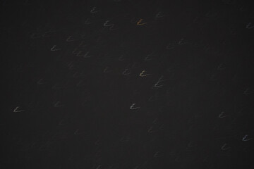 V shaped abstract blurry star motion pattern in long exposure on dark night sky