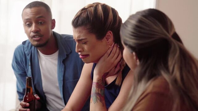 Support group of mates comforting depressive transgender crying friend, touching shoulder of unhappy frustrated transwoman with sympathy, talking, sitting in circle, discussing problems
