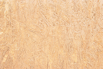 A sheet of brown paint recycled pressed wood texture