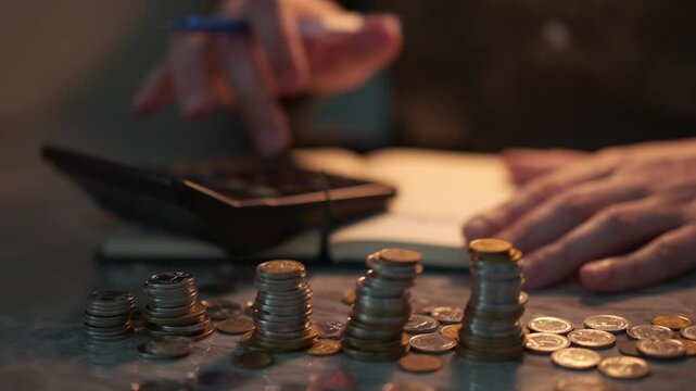 The investor counts money.
Businessman with a calculator counts money.
Coins on the table.
Lots of money on the table.
Banking work
The financier makes a report on the money.
Microloans at the bank.
