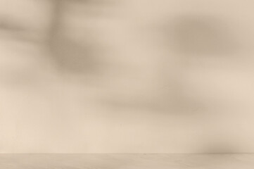 Abstract natural background with natural soft shadows on concrete neutral sand beige wall texture,...