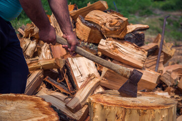 Man holding an industrial ax. Ax in man  hand