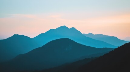 Blue mountains silhouetted against an early morning or evening sky