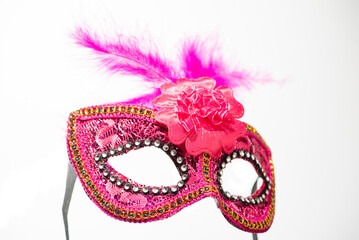 Fototapeta premium Carnival mask, beautiful carnival mask in detail, with white background, selective focus.