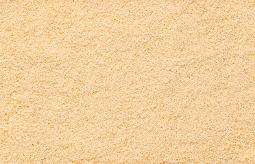 Macro photography of ground almonds, alternative keto flour, chopped raw nuts, ketogenic diet, healthy vegan food