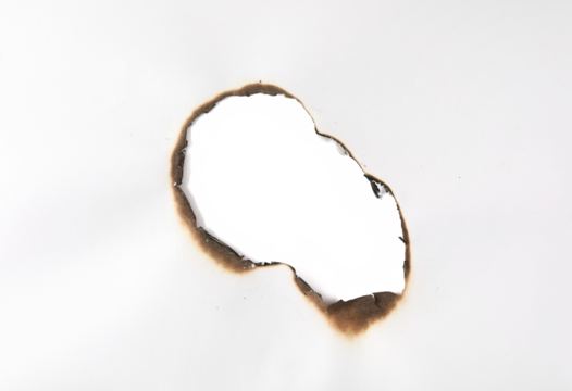 Burnt hole of paper, texture and background, clipping path	