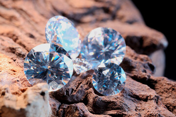 Beautiful shiny gemstones on stone, closeup view