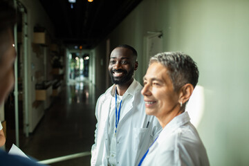 Medical team discussing patient care in hospital lobby