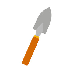 Garden trowel resting on a white surface ready for planting in a vibrant home garden