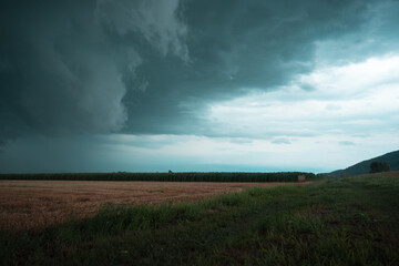 storm clouds over the field