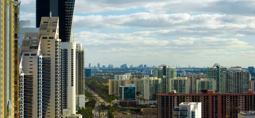 Aerial view of Sunny Isles Beach city with luxurious highrise hotels and condos on Atlantic ocean...