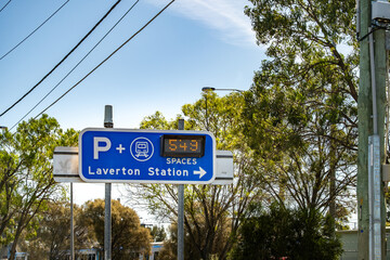 A parking sign for Laverton Station in Melbourne, Australia, featuring a digital screen that...