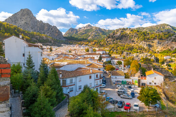 Panoramic view of the white village of Grazalema, Spain, in the Province of Cadiz with the Sierra del Pinar mountain range in view.	