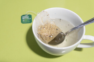 Microplastics in food. Plastic particles in supermarket tea bags. Concept, Health problems, cancer, kidney disease and environmental pollution. copy space.