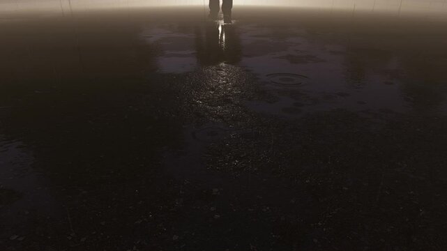 Silhouette walking in the dark