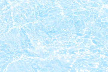 Blue water with ripples on the surface. Defocus blurred transparent blue colored clear calm water...
