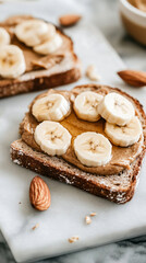 Homemade Almond Butter Toast with Sliced Banana and Honey Drizzle Healthy Breakfast