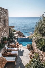 Beautiful coastal retreat offers stunning sea views, cozy seating, and a refreshing pool, perfect for relaxation by the ocean in a tranquil natural setting