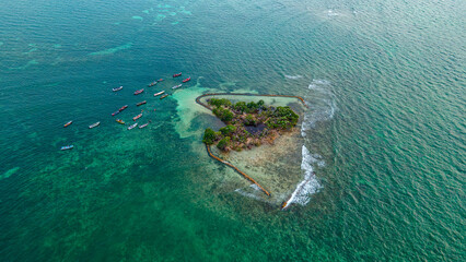 Aerial View of a Tropical Island Surrounded by the Caribbean Sea with Boats in Rincon del Mar, Sucre, Colombia