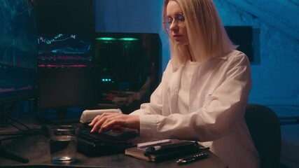 Computer late night work online crypto trading chart Caucasian business woman programmer hacker coder businesswoman broker trader thinking analyzing bitcoin price cyber security e-business investment