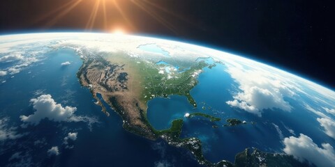 Fototapeta premium A Sunrise View of the North American Continent from Space, Showing Detailed Terrain and Cloud Cover