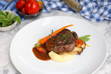 Savory beef steak dinner close-up food photography in cozy kitchen