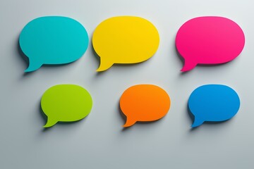 a close up of a group of speech bubbles with different colors