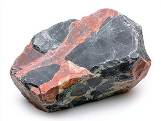 Striking close up of a colorful metamorphic rock with red and black bands on a white background showcasing geological textures and patterns
