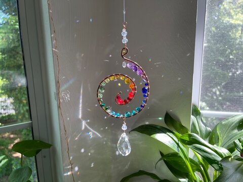 Beautiful colorful suncatcher made from the glass beads and metal. Sun catcher pendant home decor rainbow chakras 