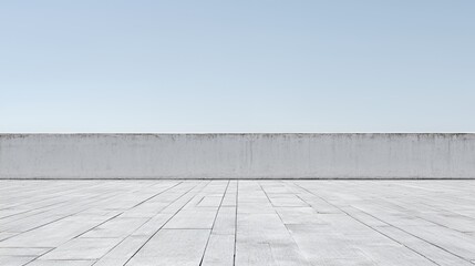 Fototapeta premium White Concrete Wall and Floor Against a Light Blue Sky