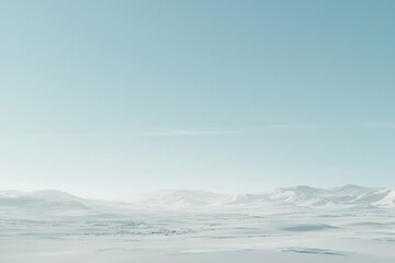 Fototapeta premium Serene Snowy Landscape Under Clear Blue Sky in Winter Season