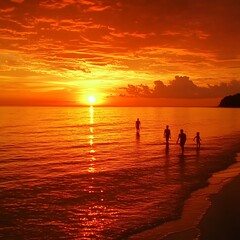 Fototapeta premium Family wades ocean sunset beach