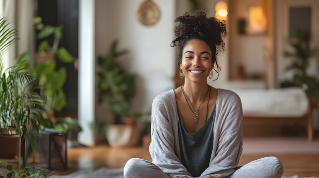 Smiling Woman Enjoying Self Care in Cozy Home Environment with Plants and Wellness Elements