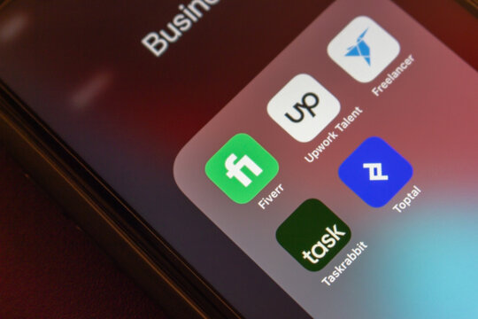 Mexico City, MEXICO - Feb 23 2025 : Fiverr, Upwork, Freelancer.com, Taskrabbit and Toptal icons are displayed on an iPhone. Concept of major global freelance and gig work platforms.