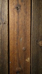 Fototapeta premium Rough-hewn wooden planks on a wooden table with visible knots and cracks, wood texture, wooden