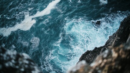 The stunning waves of coastal cliffs crash against the shore