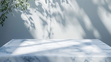 clean white marble top with icy blue veins, surrounded by soft architectural shadows for a minimalist aesthetic