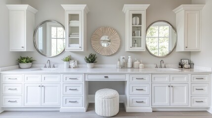 Modern, white bathroom vanity with round mirrors