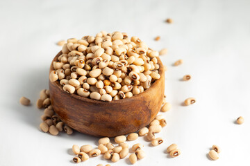 Black-eyed peas are small, beige legumes with a black spot, rich in protein, fiber, and nutrients, commonly used in India, Southern and African cuisine.